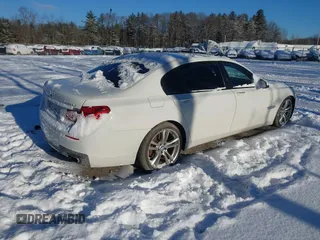 2014 BMW 7 Series 740Li xDrive with VIN WBAYF4C57ED282182, listed as a IAAI auction lot 41324877 with 102,699 mi miles. Bid and sale history available at carsss.com. Image 4.