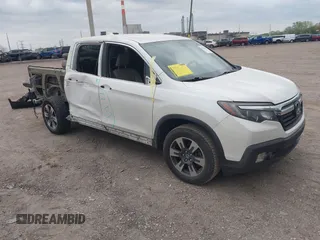 2017 Honda Ridgeline RTL with VIN 5FPYK3F57HB008389, listed as a IAAI auction lot 42148100 with 142,028 mi miles and . Bid and sale history available at DreamBid. Image 1.