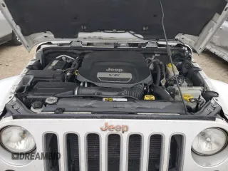 2016 Jeep Wrangler Unlimited 75th Anniversary with VIN 1C4BJWEG8GL143348, listed as a Copart auction lot 44254585 with 111,616 mi miles and Salvage Title. Bid and sale history available at carsss.com. Image 12.