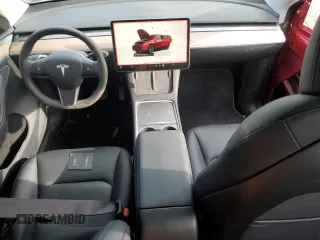 2024 Tesla Model Y Long Range z VIN 7SAYGDEE8RA302077, wystawiony jako Copart lot #52622465 z przebiegiem 11 830 mil mil oraz Szkoda całkowita • Salvage title. Historia ofert i sprzedaży dostępna na DreamBid. Obrazek 8.
