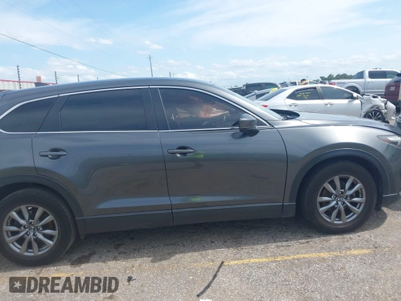 2019 Mazda CX-9 Sport with VIN JM3TCABY0K0327361, listed as a IAAI auction lot 42362232 with 264,699 mi miles and . Bid and sale history available at DreamBid. Image 13.