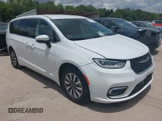2023 Chrysler Pacifica Hybrid Touring L with VIN 2C4RC1L71PR622474, listed as a IAAI auction lot 42595061 with 55,880 mi miles and . Bid and sale history available at DreamBid. Image 1.