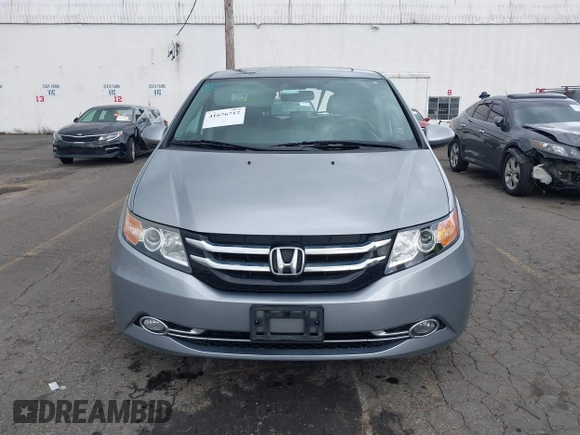 2016 Honda Odyssey EX-L with VIN 5FNRL5H64GB048004, listed as a IAAI auction lot 41676712 with 129,343 mi miles. Bid and sale history available at carsss.com. Image 12.