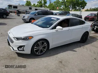 2020 Ford Fusion Titanium with VIN 3FA6P0D9XLR137942, listed as a Copart auction lot 57707835 with 109,699 mi miles and Salvage title. Bid and sale history available at DreamBid. Image 1.