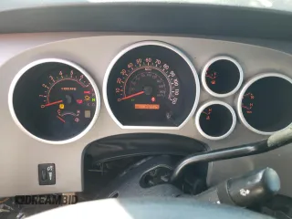 2013 Toyota Tundra с VIN 5TFDY5F10DX284847, выставлен на аукционе Copart как лот 52356135 с пробегом 80 774 миль миль и Списание • Salvage title. История ставок и продаж доступна на DreamBid. Изображение 9.