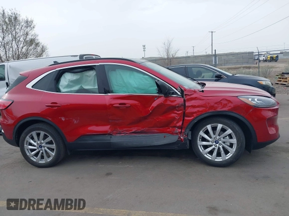 2021 Ford Escape Titanium Hybrid with VIN 1FMCU9DZ1MUA01599, listed as a IAAI auction lot 41912441 with 20,660 mi miles and . Bid and sale history available at DreamBid. Image 12.