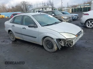 2001 Ford Focus LX with VIN 1FAFP33P31W297608, listed as a IAAI auction lot 41663965 with 142,898 mi miles and . Bid and sale history available at carsss.com. Image 1.