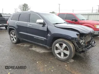 2014 Jeep Grand Cherokee Limited with VIN 1C4RJEBT5EC147459, listed as a Copart auction lot 87828735 with 213,960 mi miles and Clean Title. Bid and sale history available at DreamBid. Image 4.