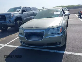 2012 Chrysler 300 Limited with VIN 2C3CCACG9CH199587, listed as a IAAI auction lot 41912142 with 158,065 mi miles. Bid and sale history available at carsss.com. Image 6.