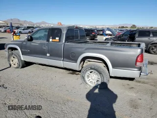 2001 Dodge Dakota Sport with VIN 1B7GG22NX1S346853, listed as a Copart auction lot 50651455 with 121,493 mi miles and Salvage Title. Bid and sale history available at carsss.com. Image 2.