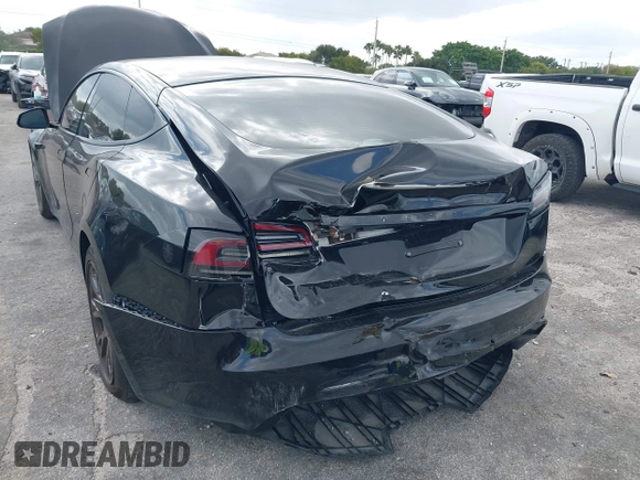 2023 Tesla Model S with VIN 5YJSA1E53PF510757, listed as a IAAI auction lot 42075624 with Not provided miles and . Bid and sale history available at DreamBid. Image 6.