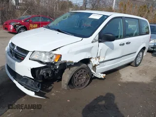 2014 Dodge Grand Caravan American Value with VIN 2C4RDGBG4ER227493, listed as a IAAI auction lot 41651263 with 206,169 mi miles and . Bid and sale history available at DreamBid. Image 2.