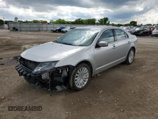 2012 Ford Fusion Hybrid с VIN 3FADP0L39CR415119, выставлен на аукционе Copart как лот 55677245 с пробегом 131 088 миль миль и Списание • Salvage title. История ставок и продаж доступна на DreamBid. Изображение 1.