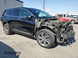 2021 Cadillac XT6 Premium Luxury with VIN 1GYKPDRS4MZ175962, listed as a Copart auction lot 59993565 with 97,157 mi miles and Salvage title. Bid and sale history available at DreamBid. Image 4.