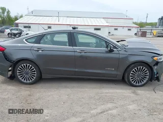 2018 Ford Fusion Titanium with VIN 3FA6P0RU1JR120392, listed as a IAAI auction lot 42145342 with Not provided miles and . Bid and sale history available at DreamBid. Image 13.