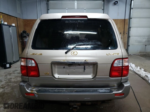 2001 Lexus LX 470 z VIN JTJHT00W213507042, wystawiony jako Copart lot #84236804 z przebiegiem 179 706 mil mil oraz Tytuł czysty. Historia ofert i sprzedaży dostępna na DreamBid. Obrazek 6.