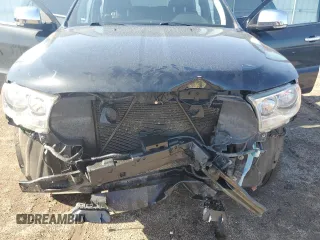 2013 Dodge Durango Crew with VIN 1C4RDJDG5DC701016, listed as a Copart auction lot 60832385 with 236,719 mi miles and Salvage title. Bid and sale history available at DreamBid. Image 12.
