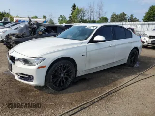 2012 BMW 3 Series 328i with VIN WBA3A5C58CF257906, listed as a Copart auction lot 63560125 with 216,550 mi miles and Clean title. Bid and sale history available at DreamBid. Image 1.