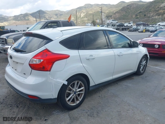 2012 Ford Focus SE with VIN 1FAHP3K24CL379060, listed as a IAAI auction lot 41955080 with 149,018 mi miles. Bid and sale history available at carsss.com. Image 4.