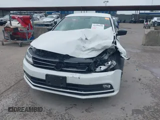 2016 Volkswagen Jetta Sport z VIN 3VWD17AJ1GM334234, wystawiony jako IAAI lot #42299618 z przebiegiem 86 143 mil mil oraz . Historia ofert i sprzedaży dostępna na DreamBid. Obrazek 6.