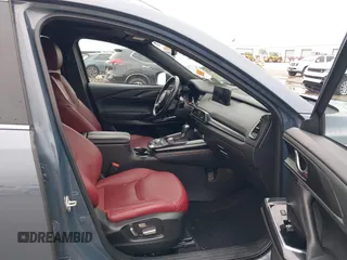 2021 Mazda CX-9 Grand Touring with VIN JM3TCBDY9M0534966, listed as a IAAI auction lot 42166071 with 77,817 mi miles and . Bid and sale history available at DreamBid. Image 5.