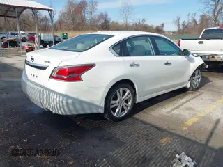2015 Nissan Altima SL with VIN 1N4BL3AP0FC221236, listed as a IAAI auction lot 41798929 with 122,521 mi miles and . Bid and sale history available at carsss.com. Image 4.