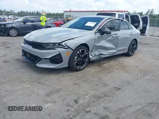 2023 Kia K5 GT-Line z VIN 5XXG64J25PG179696, wystawiony jako IAAI lot #42114587 z przebiegiem 49 192 mil mil oraz . Historia ofert i sprzedaży dostępna na DreamBid. Obrazek 2.