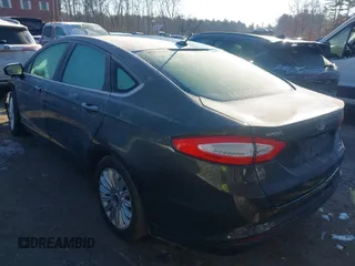 2015 Ford Fusion SE Hybrid with VIN 3FA6P0LUXFR165766, listed as a IAAI auction lot 41409353 with 32,388 mi miles. Bid and sale history available at carsss.com. Image 3.