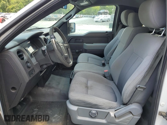 2012 Ford F-150 XL with VIN 1FTNF1CF9CKD27242, listed as a Copart auction lot 62665505 with 202,023 mi miles and Salvage title. Bid and sale history available at DreamBid. Image 7.