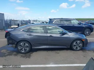 2018 Honda Civic Sedan EX-T with VIN JHMFC1F30JX018885, listed as a IAAI auction lot 41905534 with 94,560 mi miles. Bid and sale history available at carsss.com. Image 14.