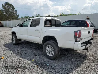2023 Toyota Tacoma SR with VIN 3TMCZ5AN8PM650454, listed as a Copart auction lot 64695855 with Not provided miles and Clean title. Bid and sale history available at DreamBid. Image 2.