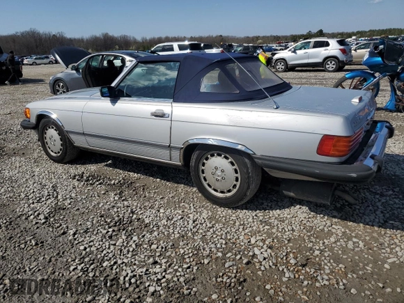 1989 Mercedes-Benz 560 Series 560SL with VIN WDBBA48D3KA097999, listed as a Copart auction lot 48649625 with 124,752 mi miles and Salvage Title. Bid and sale history available at carsss.com. Image 2.