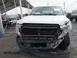 2018 Ford F-150 XL with VIN 1FTMF1CBXJKC83791, listed as a IAAI auction lot 41796119 with 196,611 mi miles. Bid and sale history available at carsss.com. Image 6.