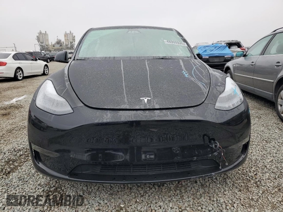 2024 Tesla Model Y Performance with VIN 7SAYGDEF1RF028278, listed as a Copart auction lot 48900935 with 41,606 mi miles and Salvage Title. Bid and sale history available at DreamBid. Image 5.