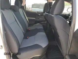 2023 Toyota Tacoma SR z VIN 3TMCZ5AN8PM589655, wystawiony jako Copart lot #56663615 z przebiegiem 43 327 mil mil oraz Szkoda całkowita • Salvage title. Historia ofert i sprzedaży dostępna na DreamBid. Obrazek 10.
