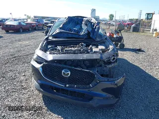 2023 Mazda CX-30 S Premium с VIN 3MVDMBDM7PM519793, выставлен на аукционе IAAI как лот 42184088 с пробегом 48 844 миль миль и . История ставок и продаж доступна на DreamBid. Изображение 12.