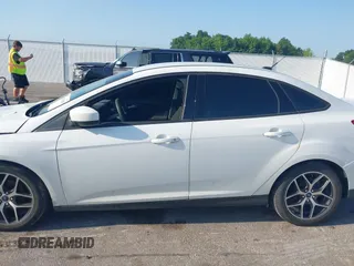 2018 Ford Focus SE с VIN 1FADP3F2XJL276733, выставлен на аукционе IAAI как лот 42537089 с пробегом Не указан миль и . История ставок и продаж доступна на DreamBid. Изображение 14.