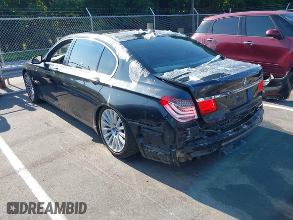 2012 BMW 7 Series 750Li with VIN WBAKB8C59CC963228, listed as a IAAI auction lot 42625772 with 136,751 mi miles and . Bid and sale history available at DreamBid. Image 3.