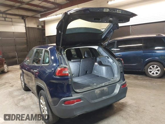 2015 Jeep Cherokee Sport with VIN 1C4PJMAB3FW564055, listed as a IAAI auction lot 42434835 with 237,027 mi miles and . Bid and sale history available at DreamBid. Image 3.