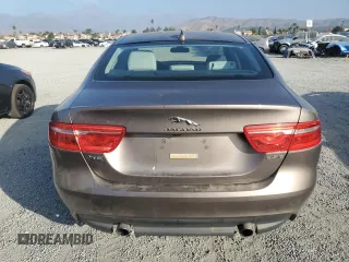 2017 Jaguar XE 25t Premium with VIN SAJAD4BG6HA957704, listed as a Copart auction lot 83630294 with 114,794 mi miles and Salvage Title. Bid and sale history available at carsss.com. Image 6.