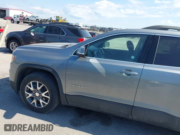 2023 GMC Acadia SLT with VIN 1GKKNML46PZ130813, listed as a IAAI auction lot 42614040 with 56,086 mi miles and . Bid and sale history available at DreamBid. Image 18.
