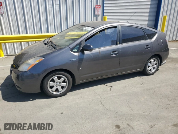2007 Toyota Prius z VIN JTDKB20U373216659, wystawiony jako Copart lot #60930375 z przebiegiem 155 283 mil mil oraz Czysty tytuł • Clean title. Historia ofert i sprzedaży dostępna na DreamBid. Obrazek 1.
