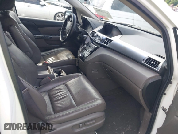 2011 Honda Odyssey Touring with VIN 5FNRL5H90BB066177, listed as a IAAI auction lot 42053368 with 239,205 mi miles and . Bid and sale history available at DreamBid. Image 5.
