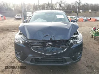 2016 Mazda CX-5 Grand Touring with VIN JM3KE4DY1G0823989, listed as a IAAI auction lot 41770149 with 40,677 mi miles. Bid and sale history available at carsss.com. Image 12.