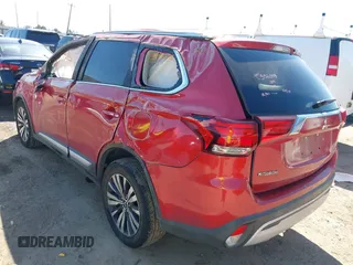 2019 Mitsubishi Outlander SE with VIN JA4AD3A31KZ021189, listed as a IAAI auction lot 41677913 with 136,130 mi miles and . Bid and sale history available at DreamBid. Image 3.