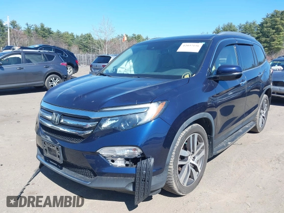 2017 Honda Pilot Touring with VIN 5FNYF6H98HB020341, listed as a IAAI auction lot 42037156 with 73,511 mi miles and . Bid and sale history available at DreamBid. Image 17.