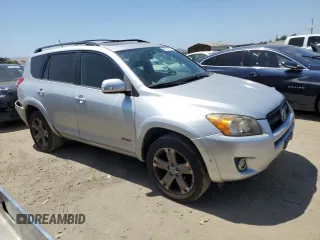 2010 Toyota RAV4 Sport with VIN JTMWF4DVXA5028981, listed as a Copart auction lot 60931165 with 214,075 mi miles and Salvage title. Bid and sale history available at DreamBid. Image 4.
