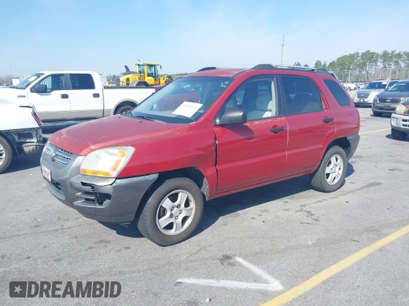 2007 Kia Sportage LX with VIN KNDJF724977426704, listed as a IAAI auction lot 41769772 with 288,082 mi miles and . Bid and sale history available at carsss.com. Image 2.