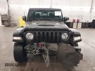 2021 Jeep Gladiator Rubicon with VIN 1C6JJTBGXML529108, listed as a IAAI auction lot 42139924 with 32,204 mi miles and . Bid and sale history available at DreamBid. Image 13.