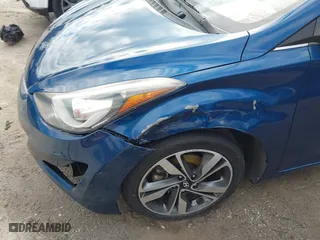 2014 Hyundai Elantra SE with VIN KMHDH4AE0EU057497, listed as a IAAI auction lot 41717476 with 115,030 mi miles. Bid and sale history available at carsss.com. Image 6.